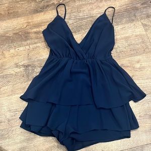 Romper. Adjustable straps. Dark blue. Size:4 side zipper.